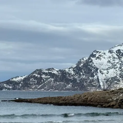 Snowy peaks above an Arctic shoreline